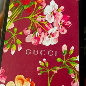 Gucci Bloom slides.